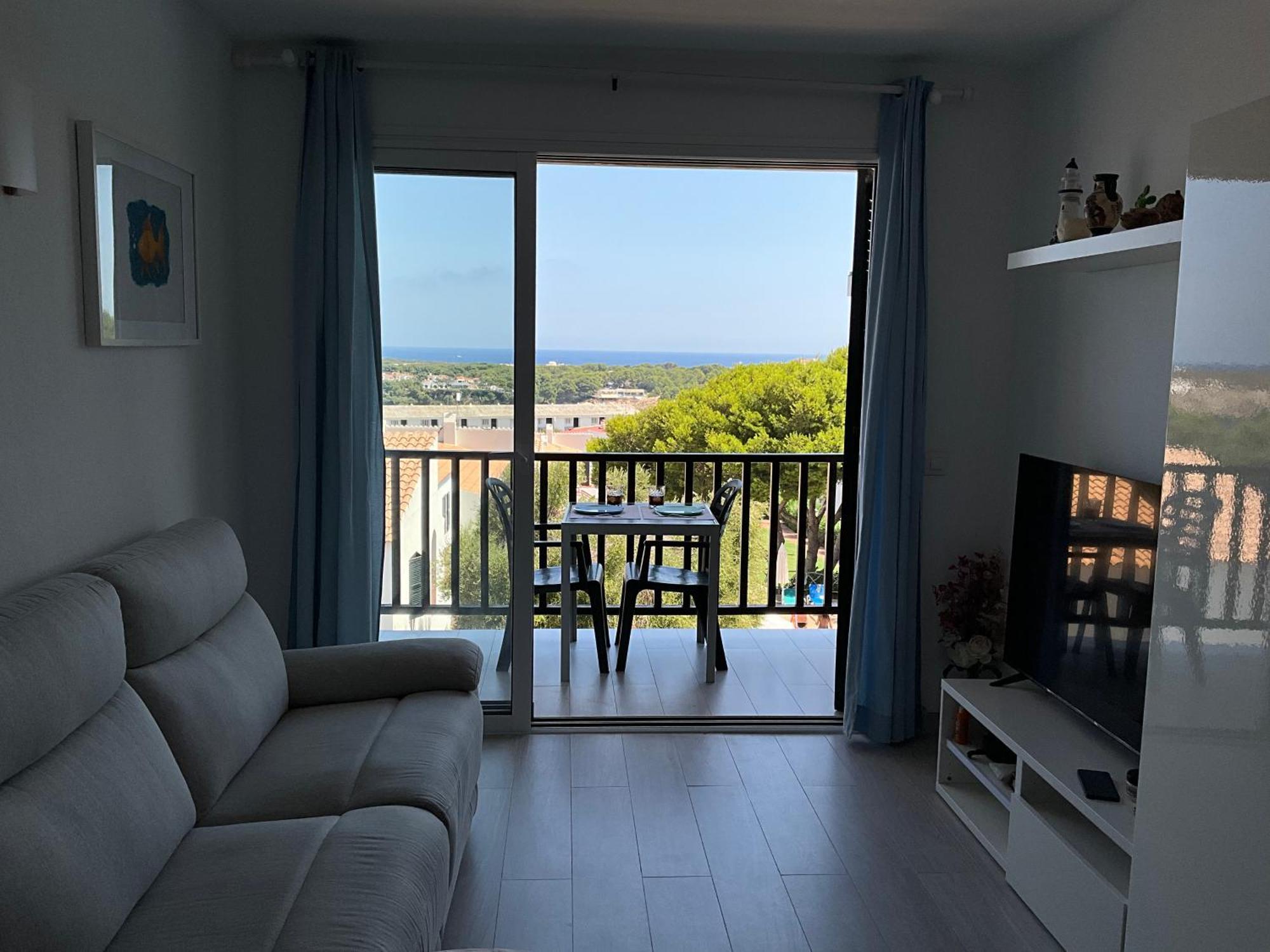 Vistas Al Mar Y La Piscina Daire Arenal d'en Castell Dış mekan fotoğraf